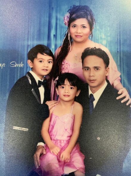 A young Bill Kayong with his wife, Hasyikin Hatt, and their two children
